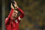  In this June 20, 2006, file photo, England's captain David Beckham acknowledges fans after their 2-2 draw with Sweden in a World Cup Group B soccer match at the World Cup Stadium in Cologne, Germany. The 38-year-old midfielder, who recently won a league title in a fourth country with Paris Saint-Germain, said Thursday, May 16, 2013, he will retire after the season. 